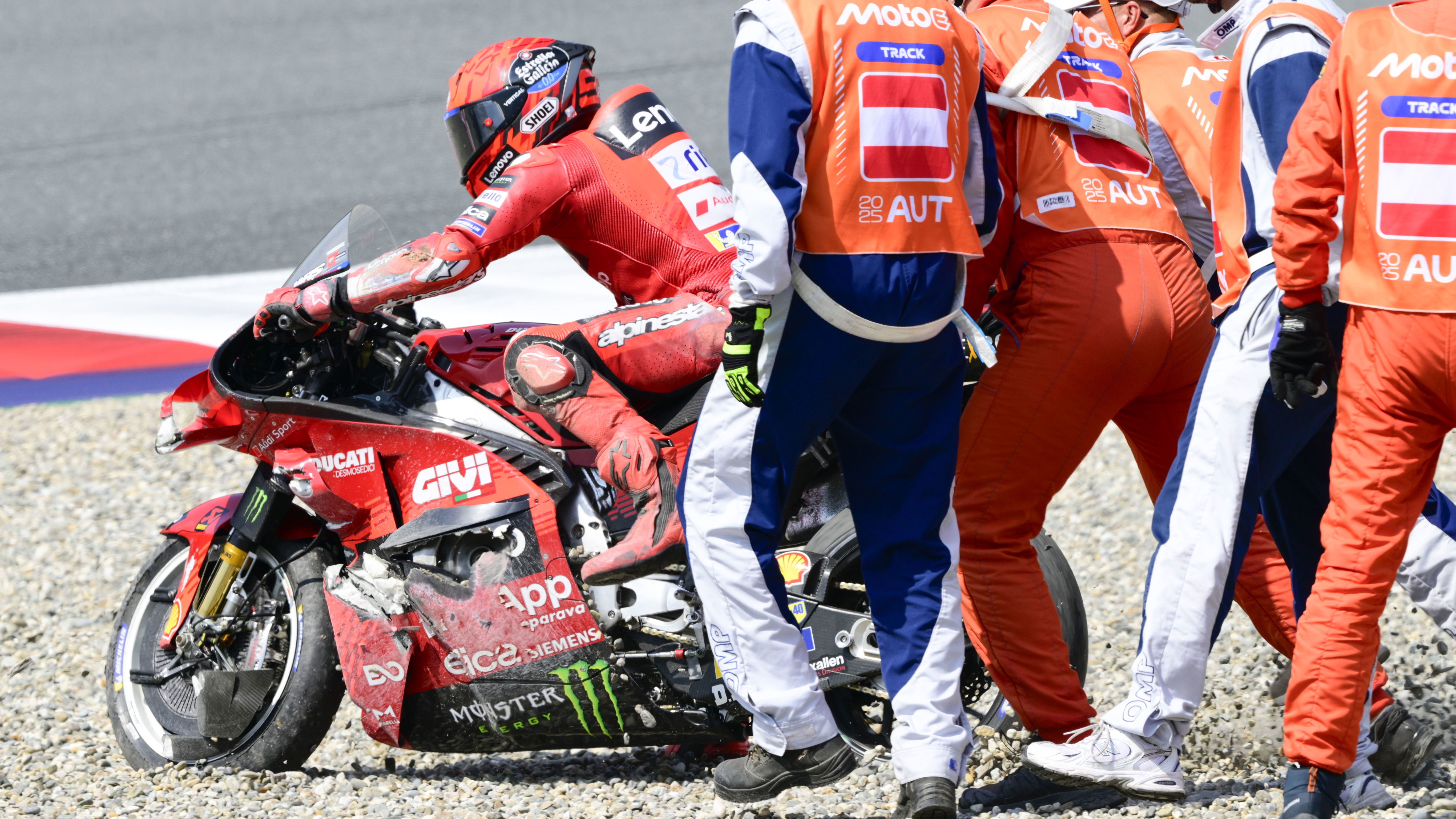 Marc Marquez restarting his bike in the gravel, 2025 MotoGP Austrian Grand Prix. Credit: Gold and Goose.