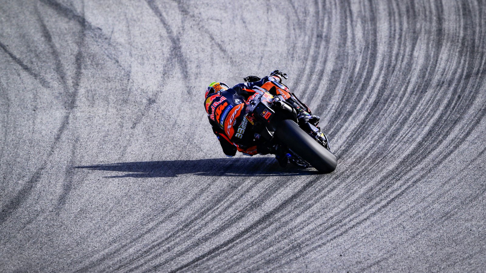 Brad Binder sliding his Red Bull KTM at the 2025 Portimao MotoGP.