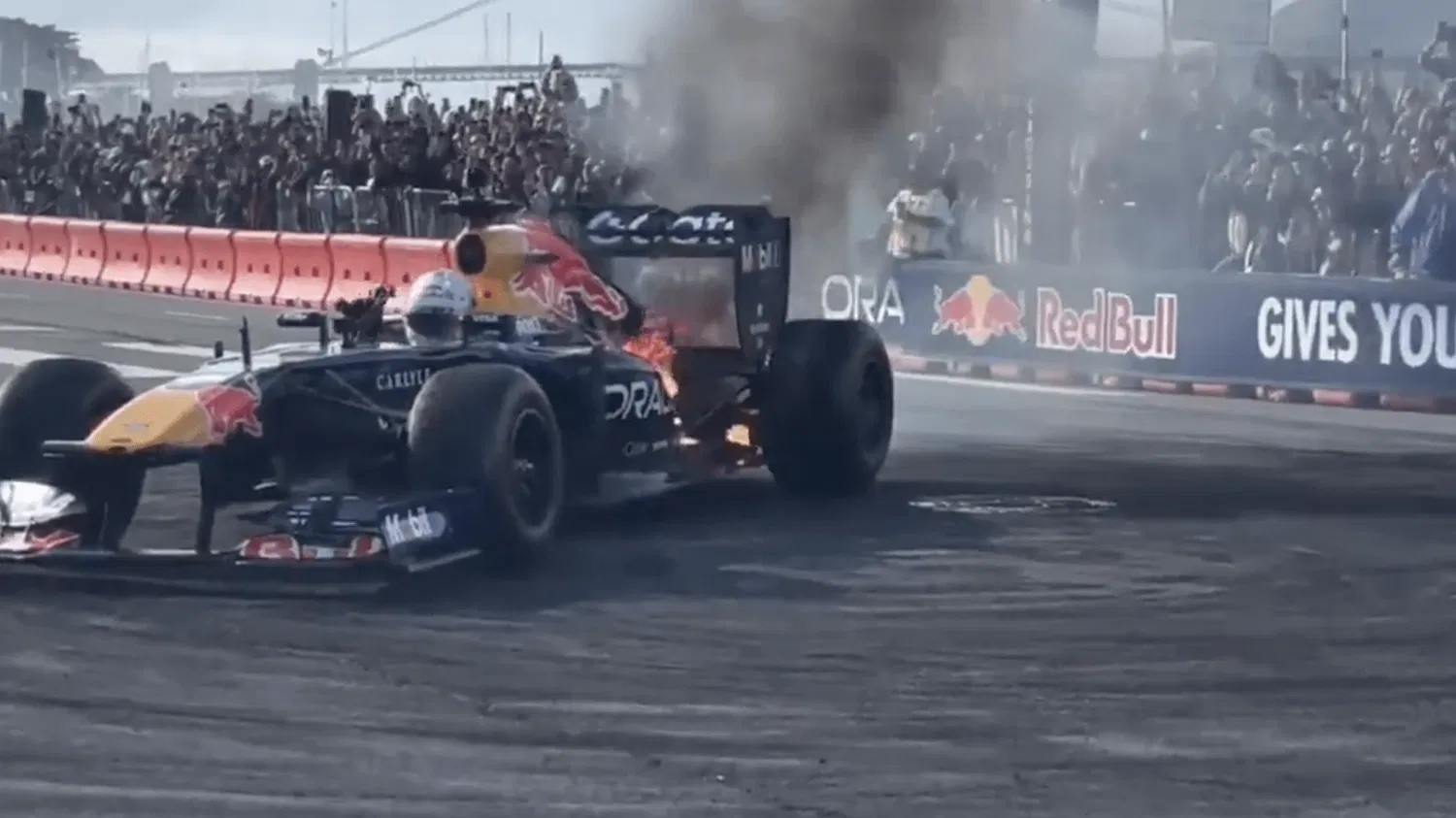 Yuki Tsunoda escapes unharmed after Red Bull F1 car catches fire.