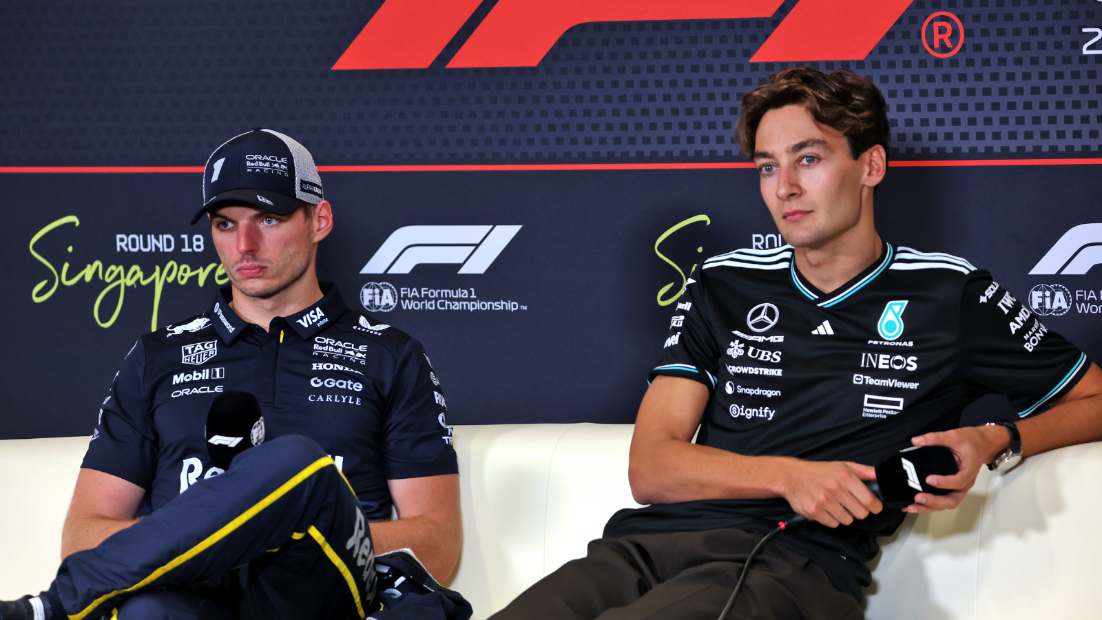 George Russell and Max Verstappen during an F1 press conference
