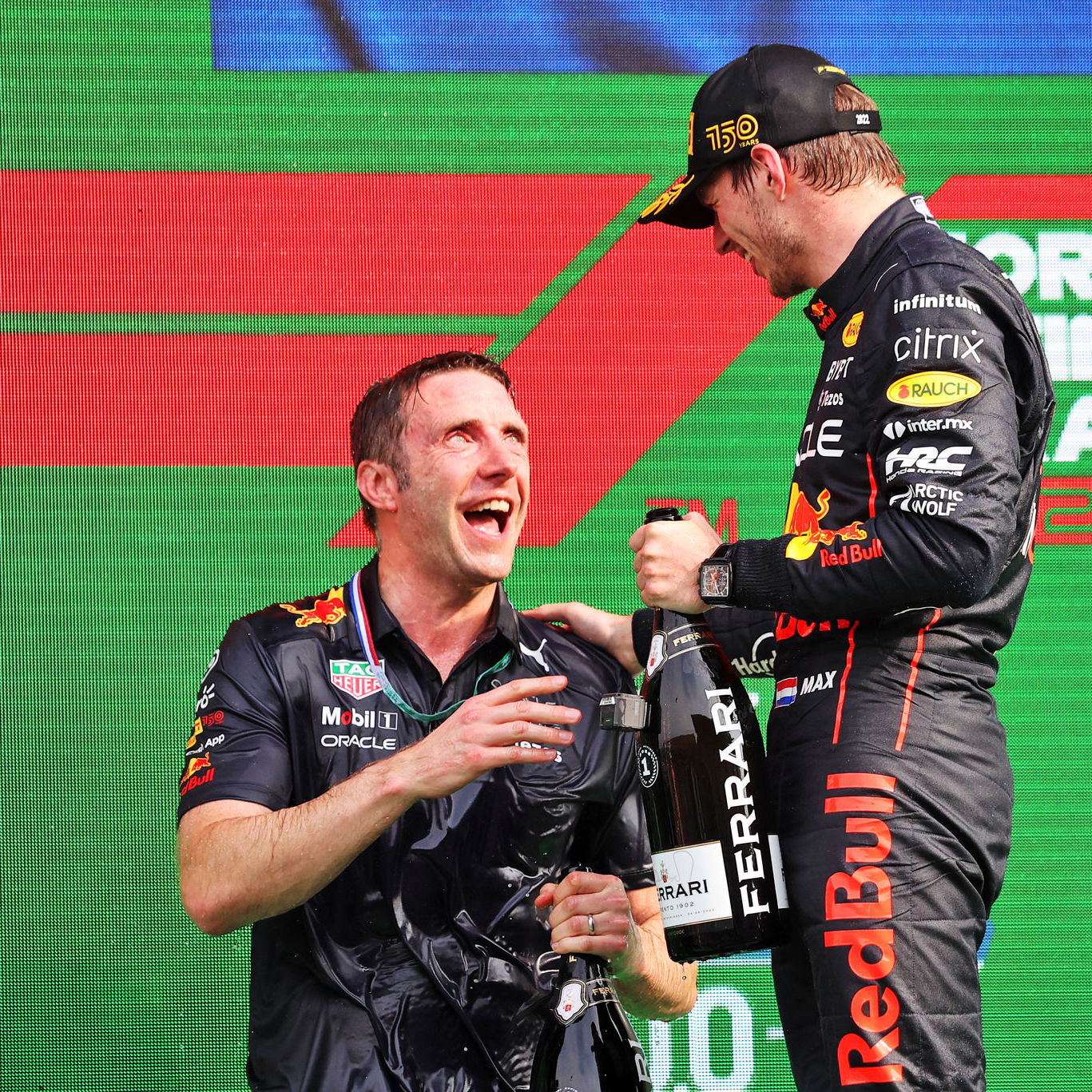 Craig Skinner and Max Verstappen on the F1 podium 