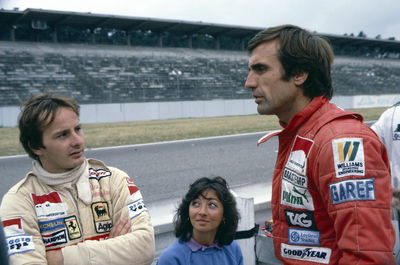 Gilles Villeneuve (CDN) Ferrari with wife Joan talks with Carlos Reutemann (ARG) Williams