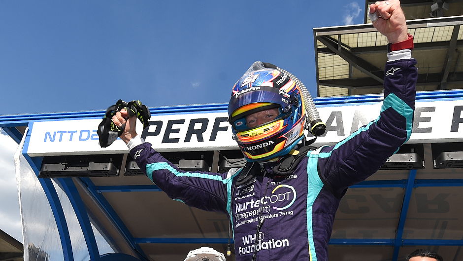 Ex-F1 driver Grosjean claims maiden IndyCar pole in third race