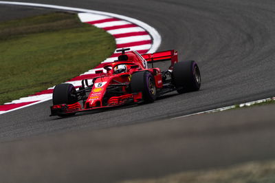 Vettel merebut pole position China F1 dari Raikkonen