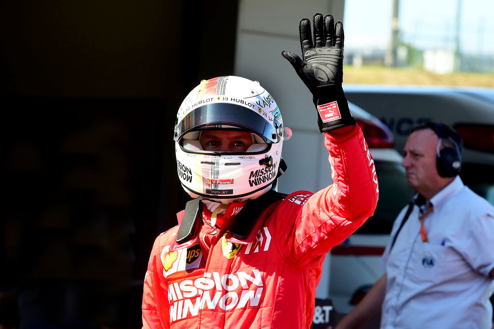 Vettel takes fifth Suzuka pole in windy Japan qualifying