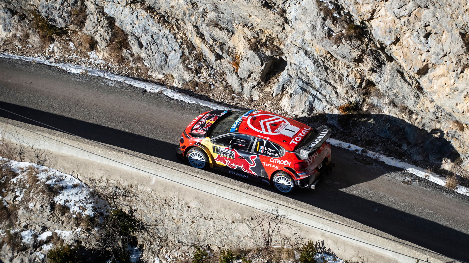 Ogier resists Neuville as Evans drops out