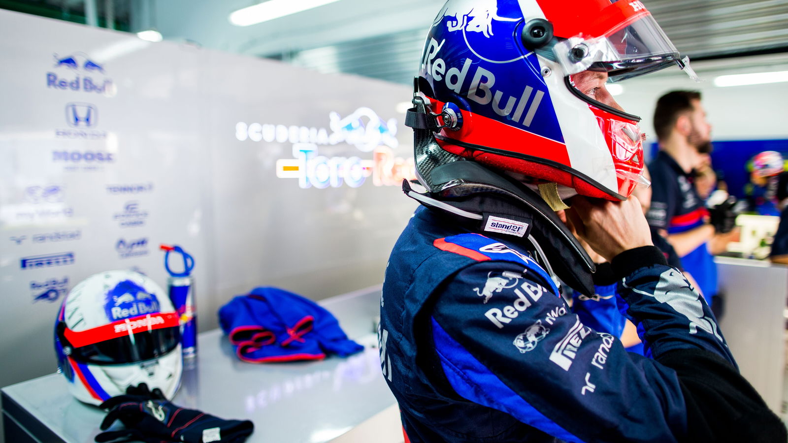 FIA to review helmet design rule after driver backlash