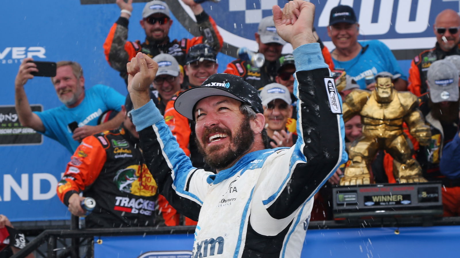 Martin Truex, Jr. surges from back to claim Dover win