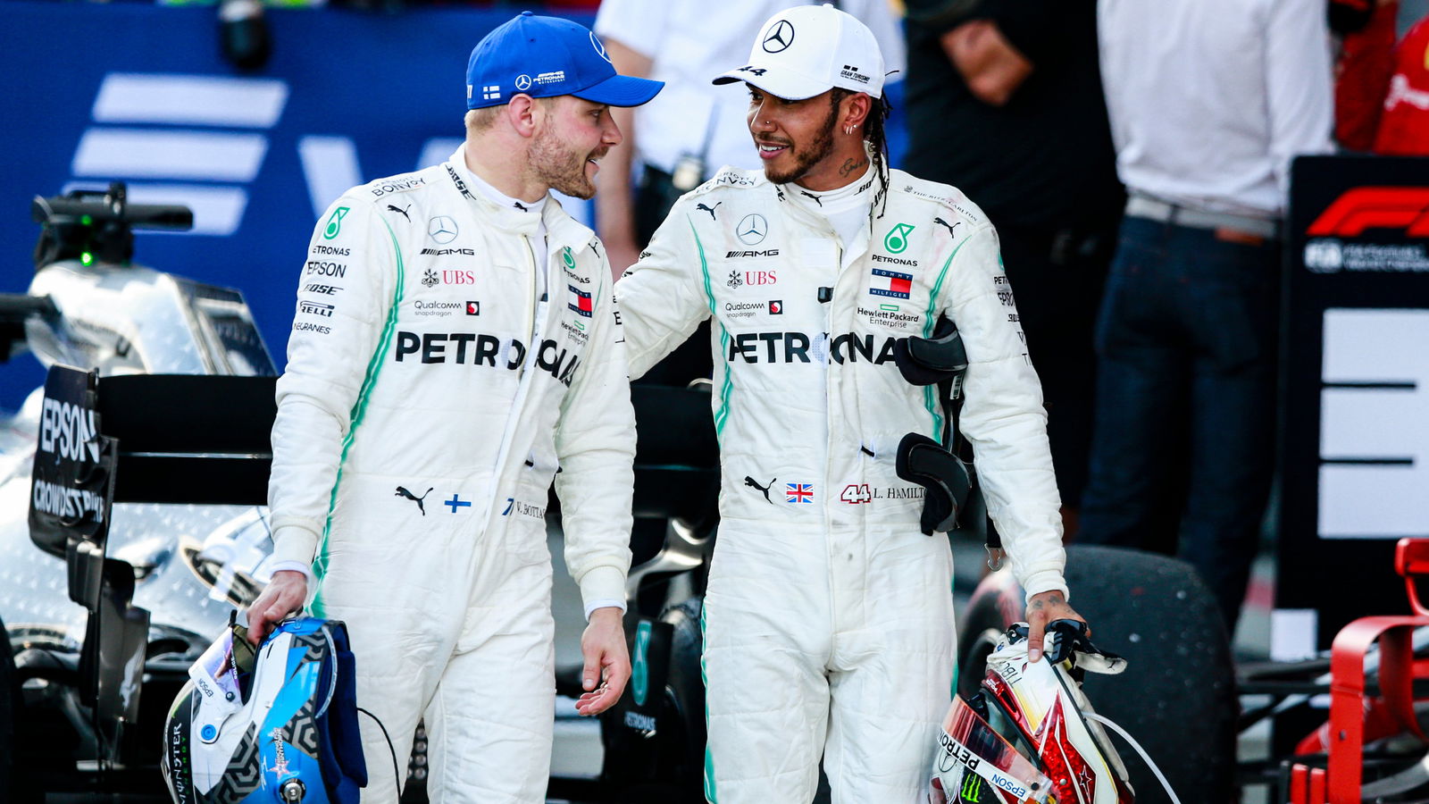 Mercedes F1 drivers race suits to be auctioned for NHS