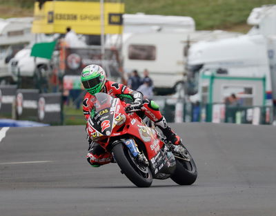 NW200: Alastair Seeley extends record with treble