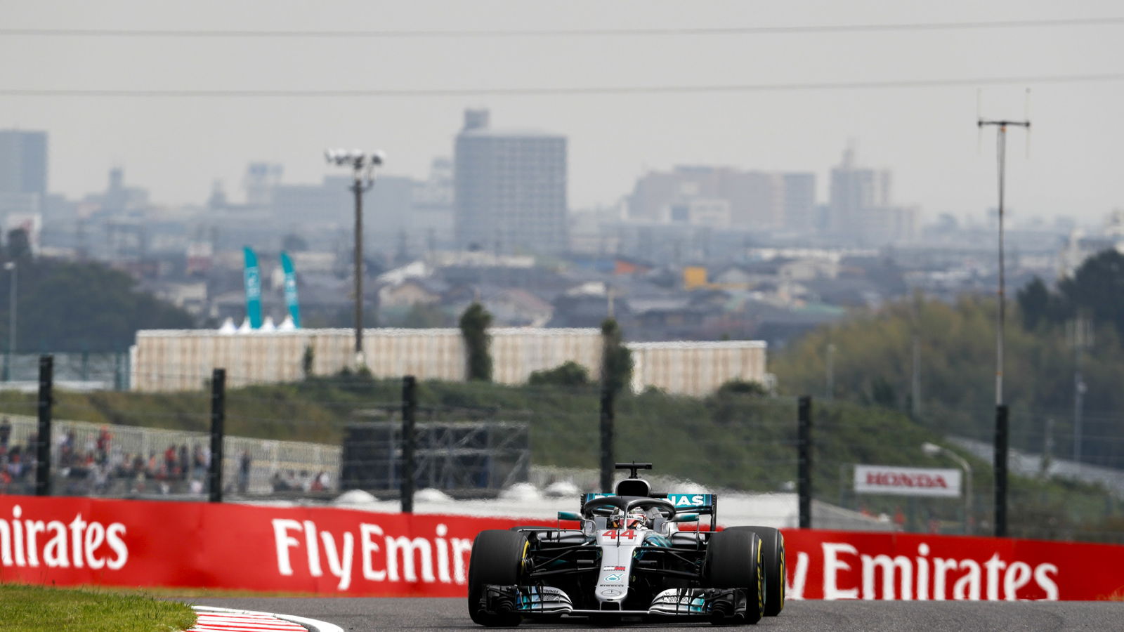 Hamilton takes Japan F1 pole as Ferrari blunder leaves Vettel 9th