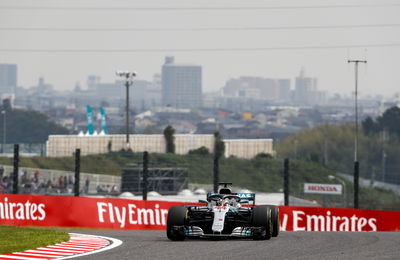 Hamilton takes Japan F1 pole as Ferrari blunder leaves Vettel 9th