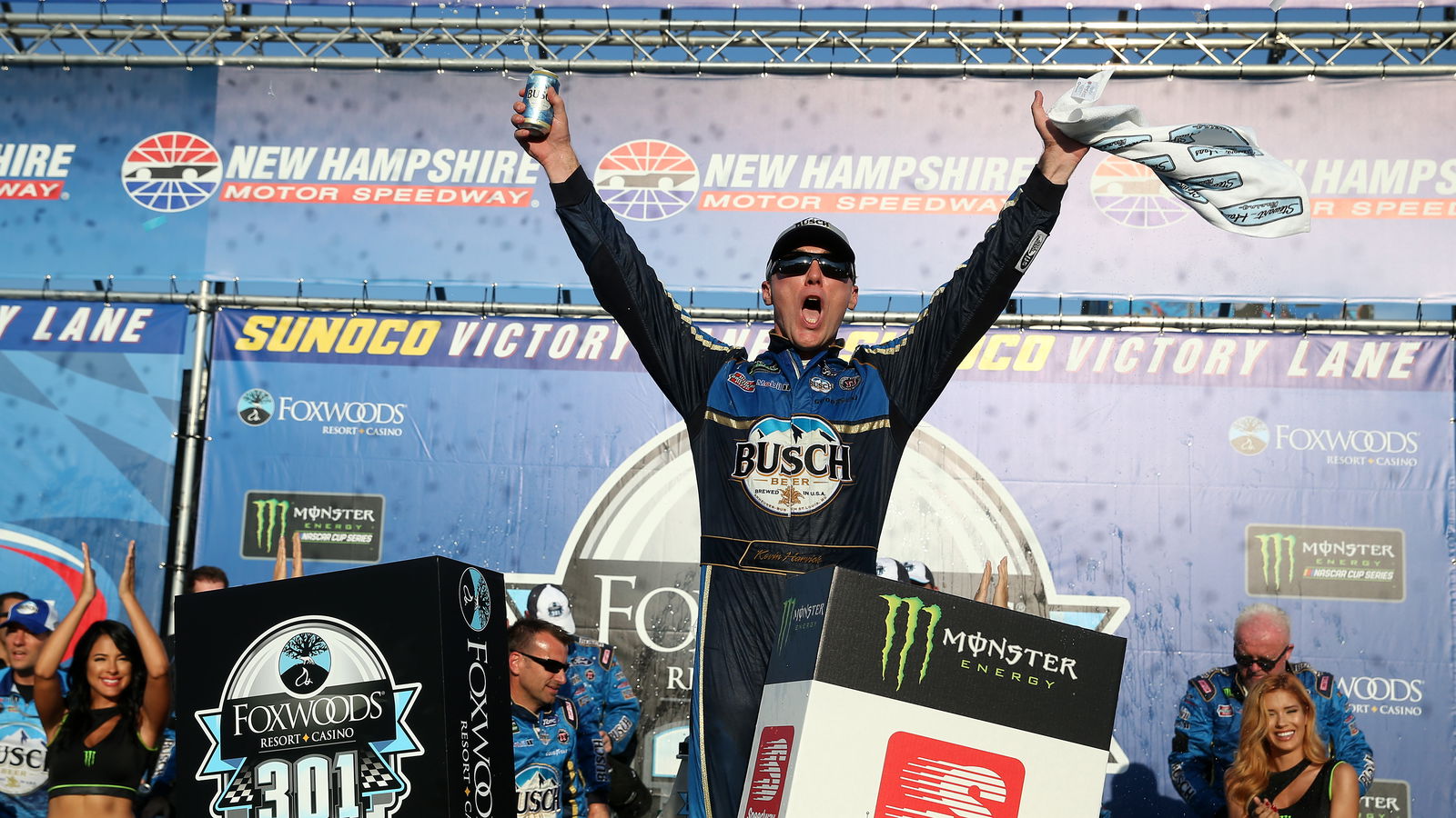 Kevin Harvick survives bump from Denny Hamlin to win New Hampshire 301