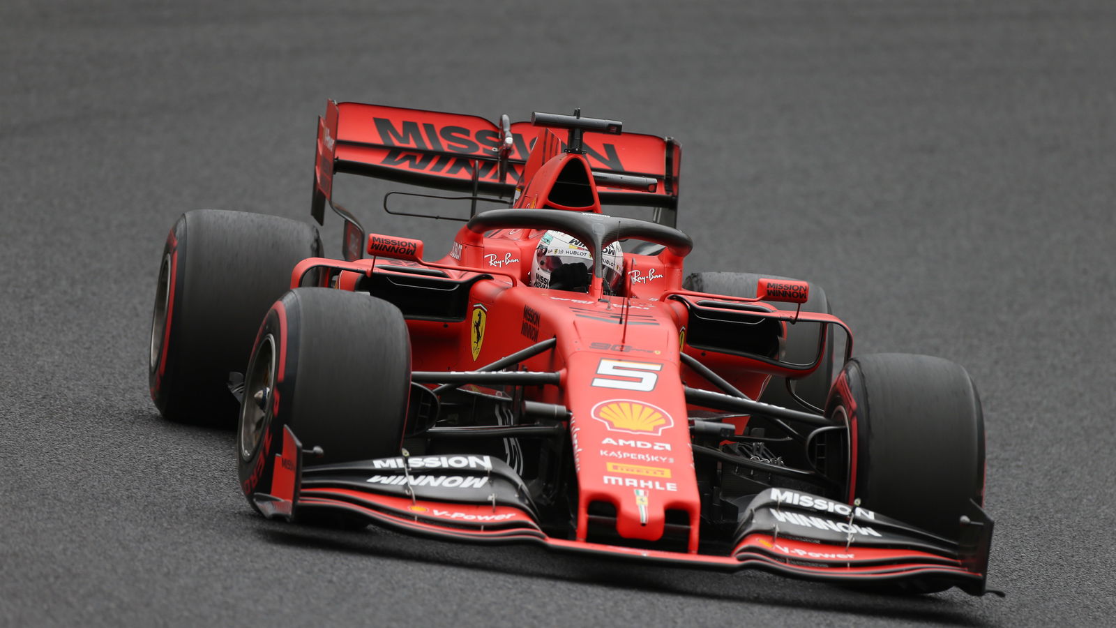 Vettel takes fifth Suzuka pole in windy Japan qualifying
