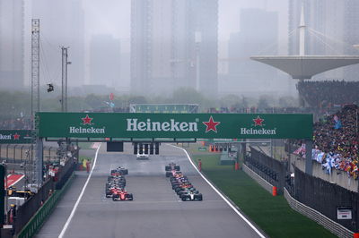 Vettel leads shortened Malaysia FP2 after Grosjean crash