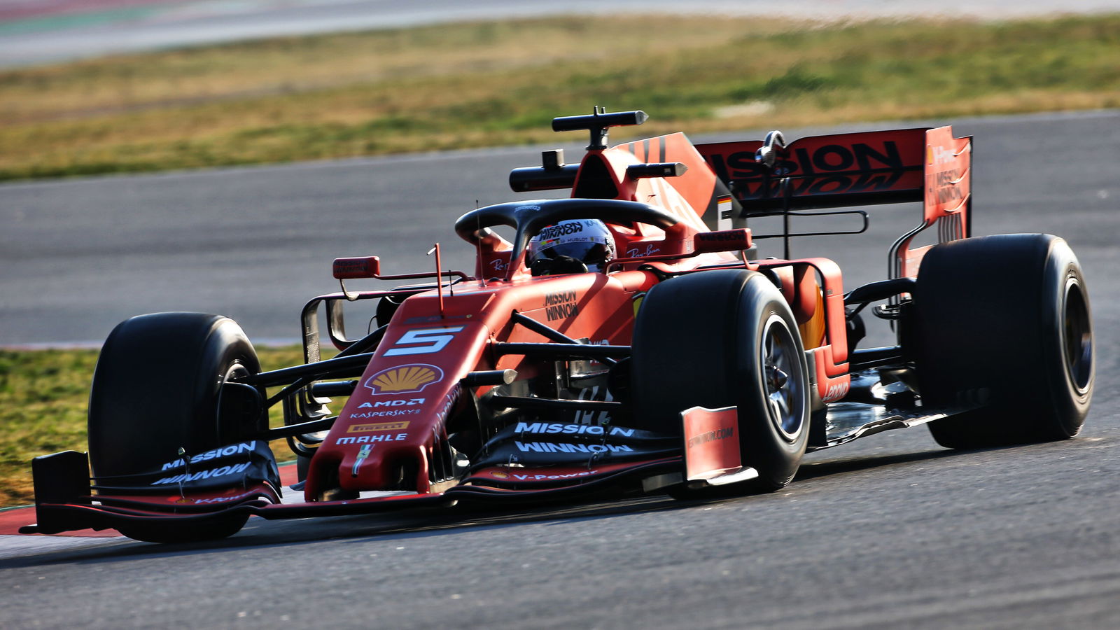 Vettel menurunkan kecepatan untuk Ferrari pada pagi terakhir pengujian F1