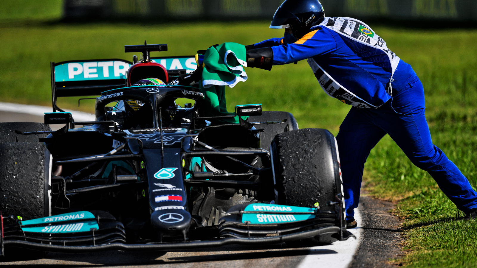 Hamilton fined for seat belt infringement, keeps Brazil F1 win
