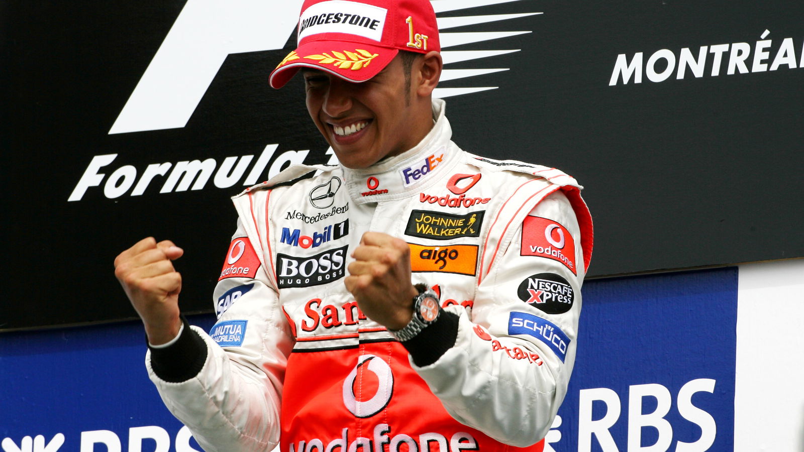 Hamilton’s first F1 winning race suit makes huge profit for owner at auction