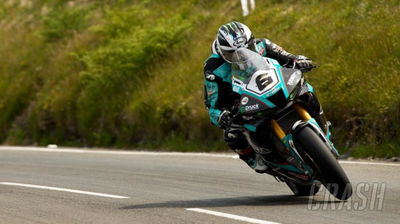 Michael Dunlop wins race then goes to the pub wearing full leathers and helmet