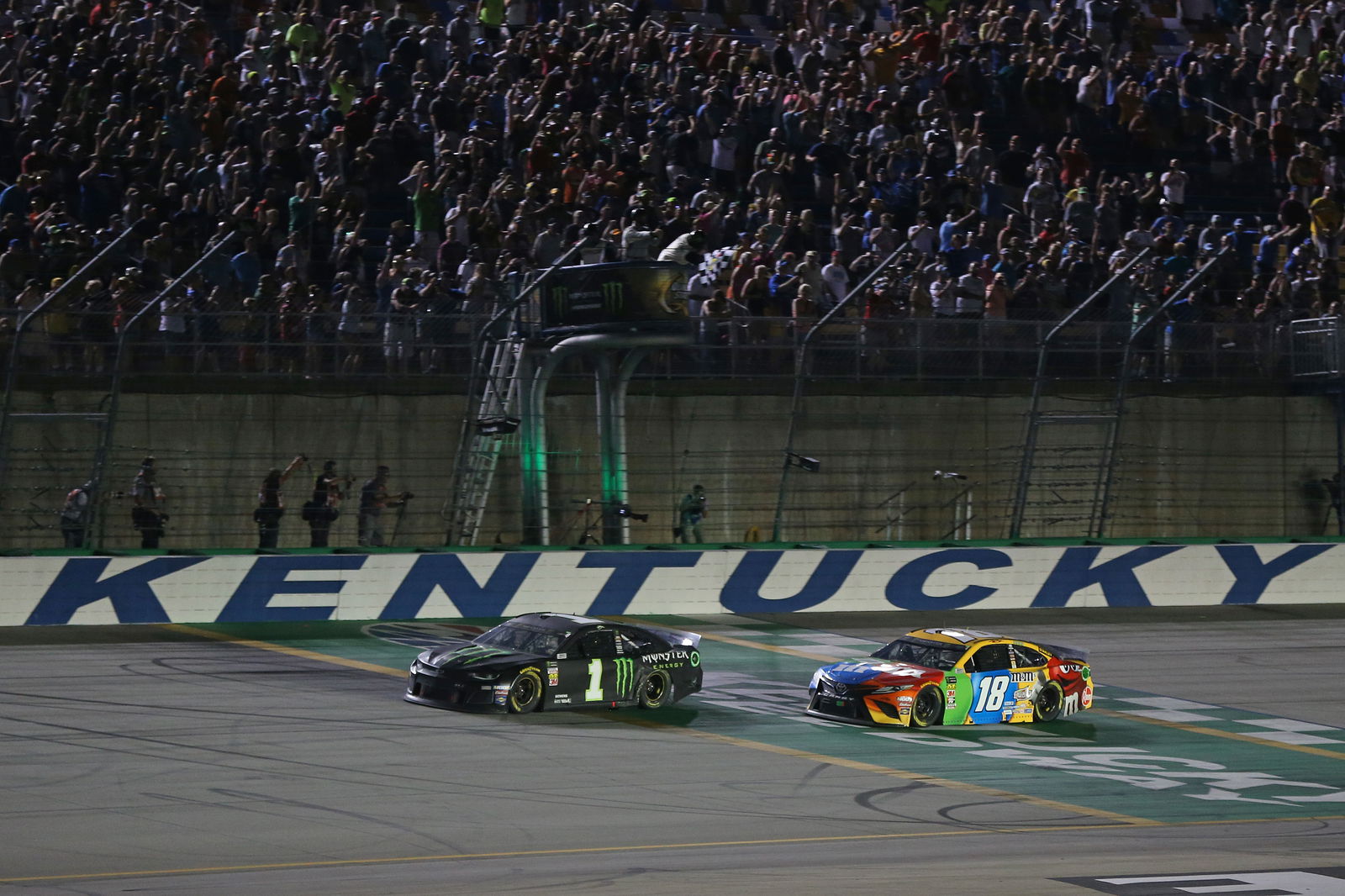 Kurt Busch victorious over brother Kyle in overtime finish at Kentucky