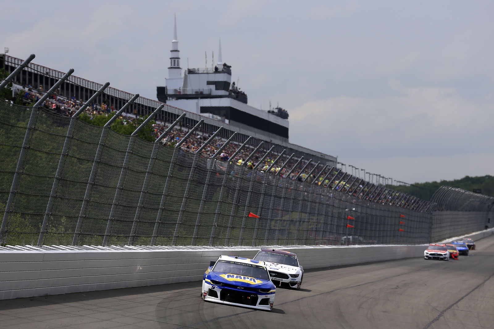 Kevin Harvick survives bump from Denny Hamlin to win New Hampshire 301