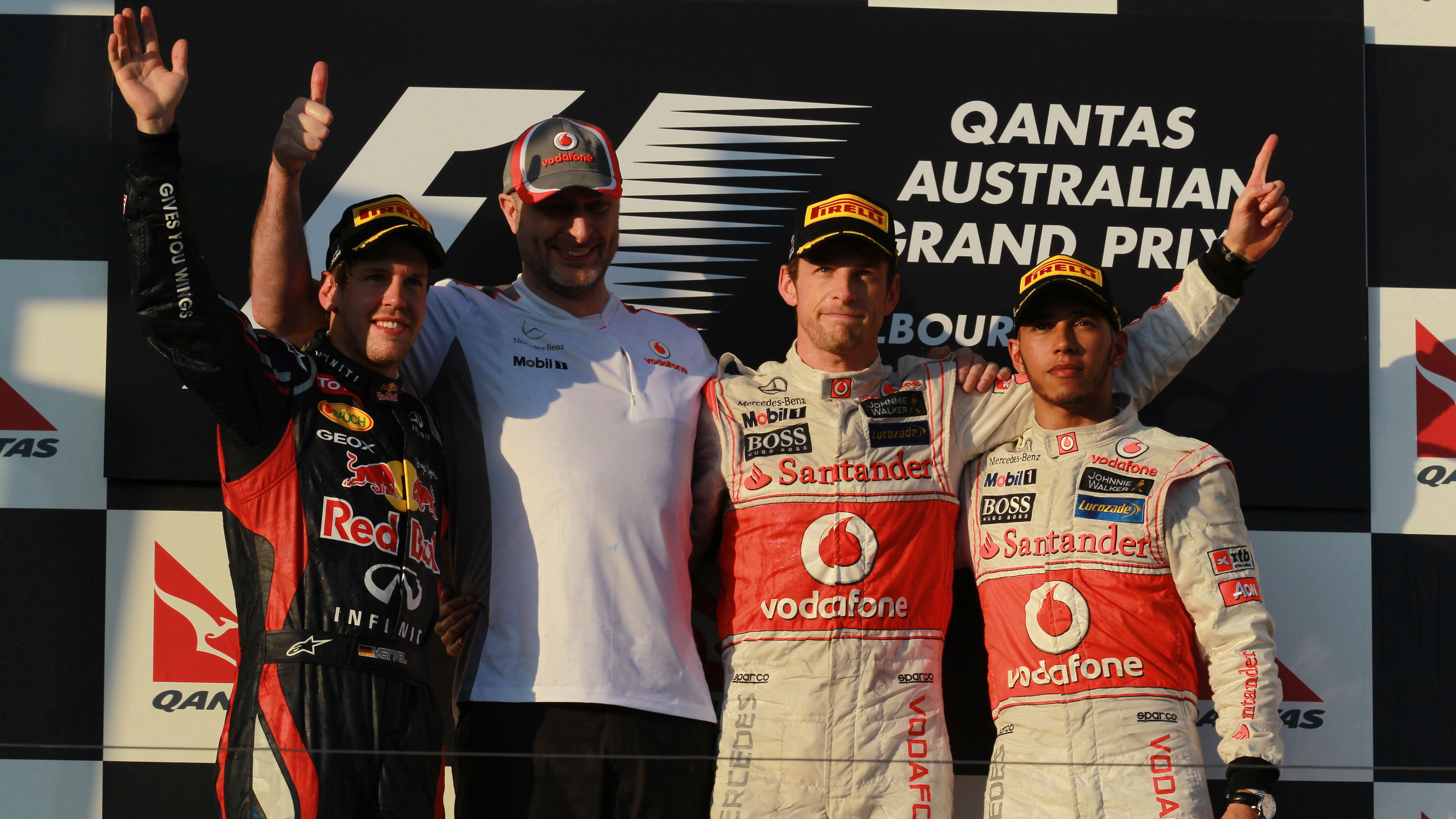 2nd place Sebastian Vettel (GER), Red Bull Racing with 1st place Jenson Button (GBR), McLaren Merced