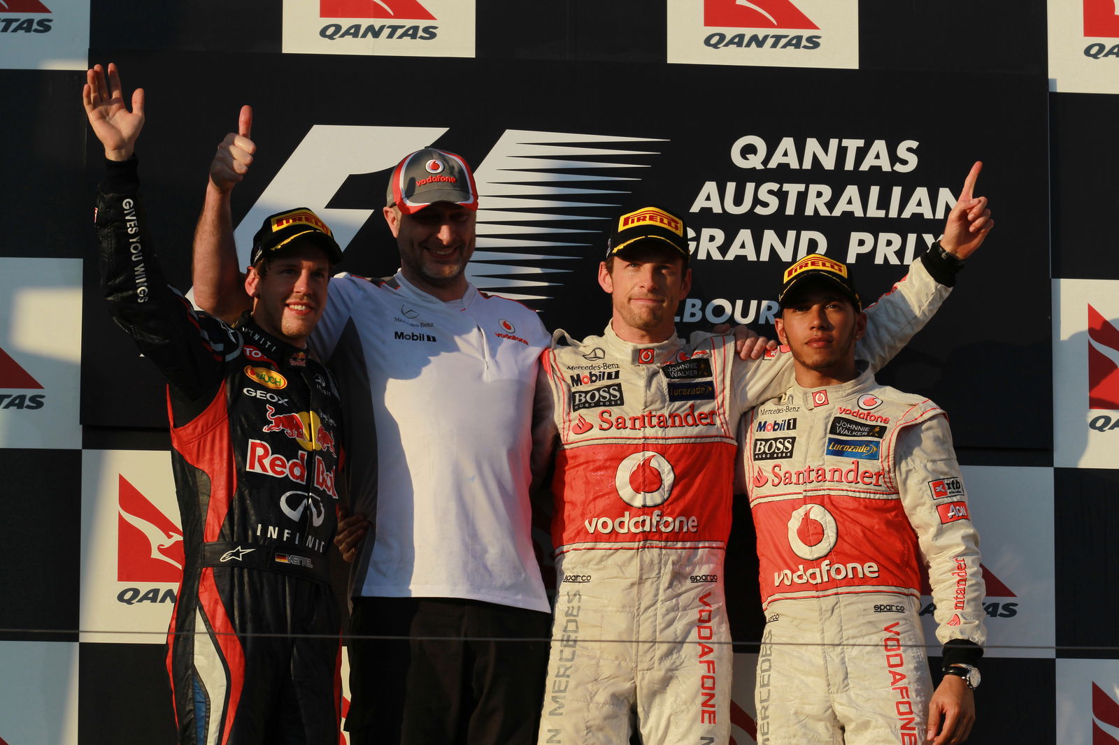 2nd place Sebastian Vettel (GER), Red Bull Racing with 1st place Jenson Button (GBR), McLaren Merced