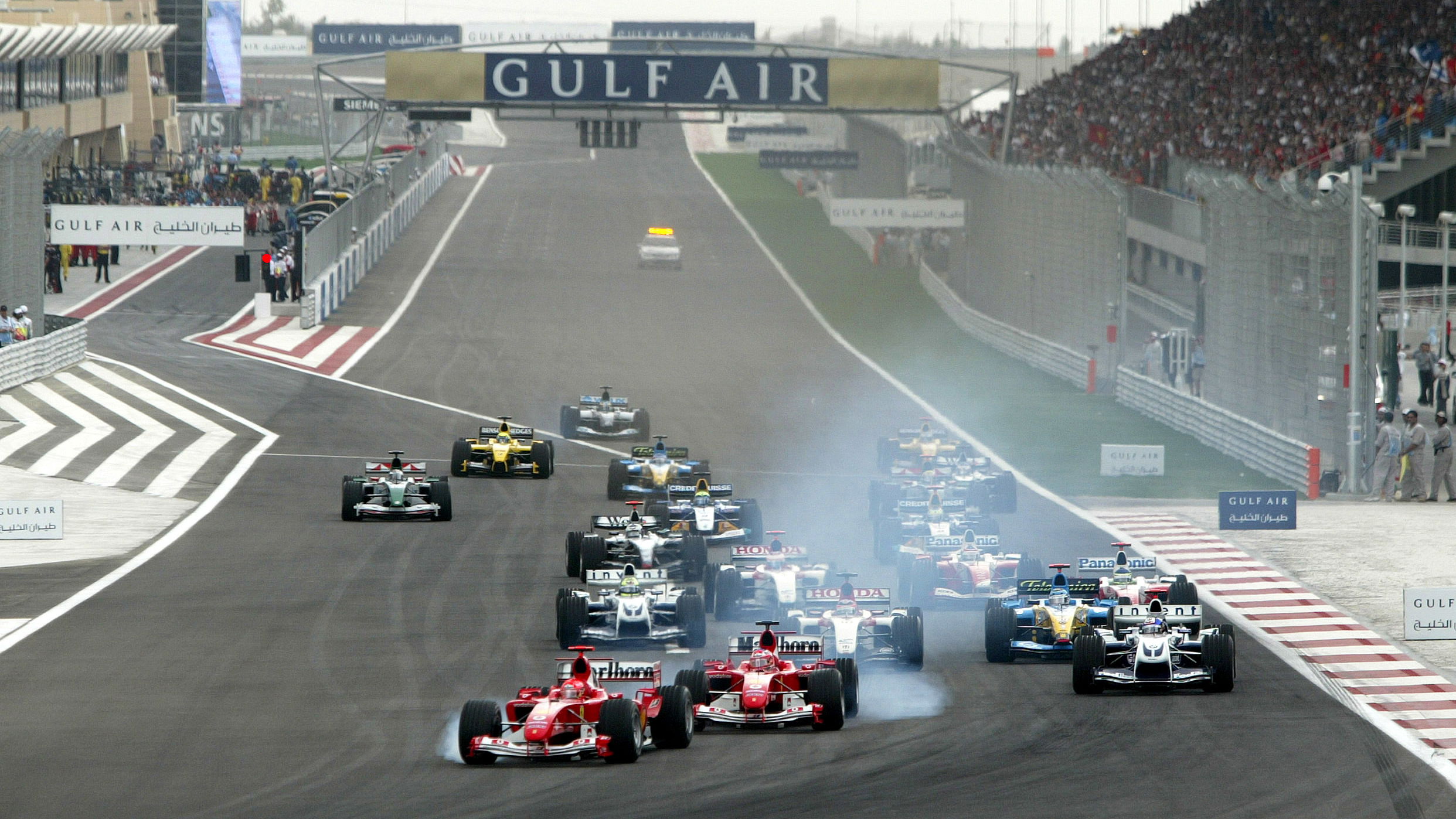 There was plenty of tyre smoke as the two Ferraris came close to touching at the start of the first 