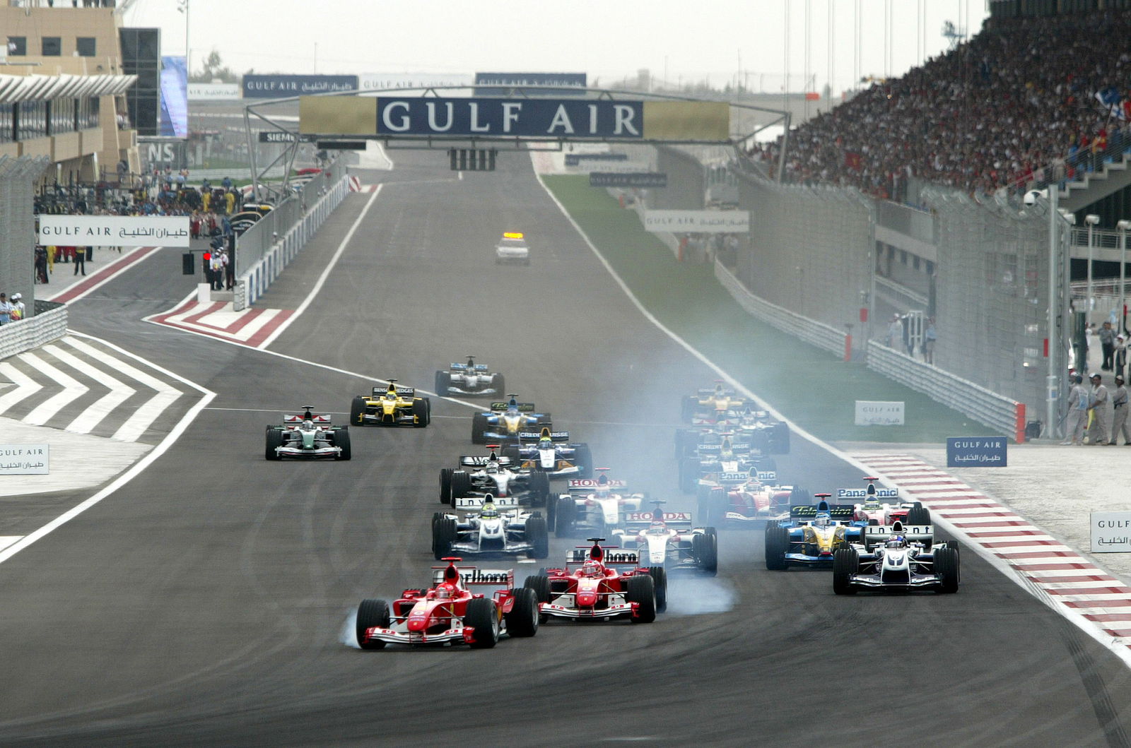 There was plenty of tyre smoke as the two Ferraris came close to touching at the start of the first 