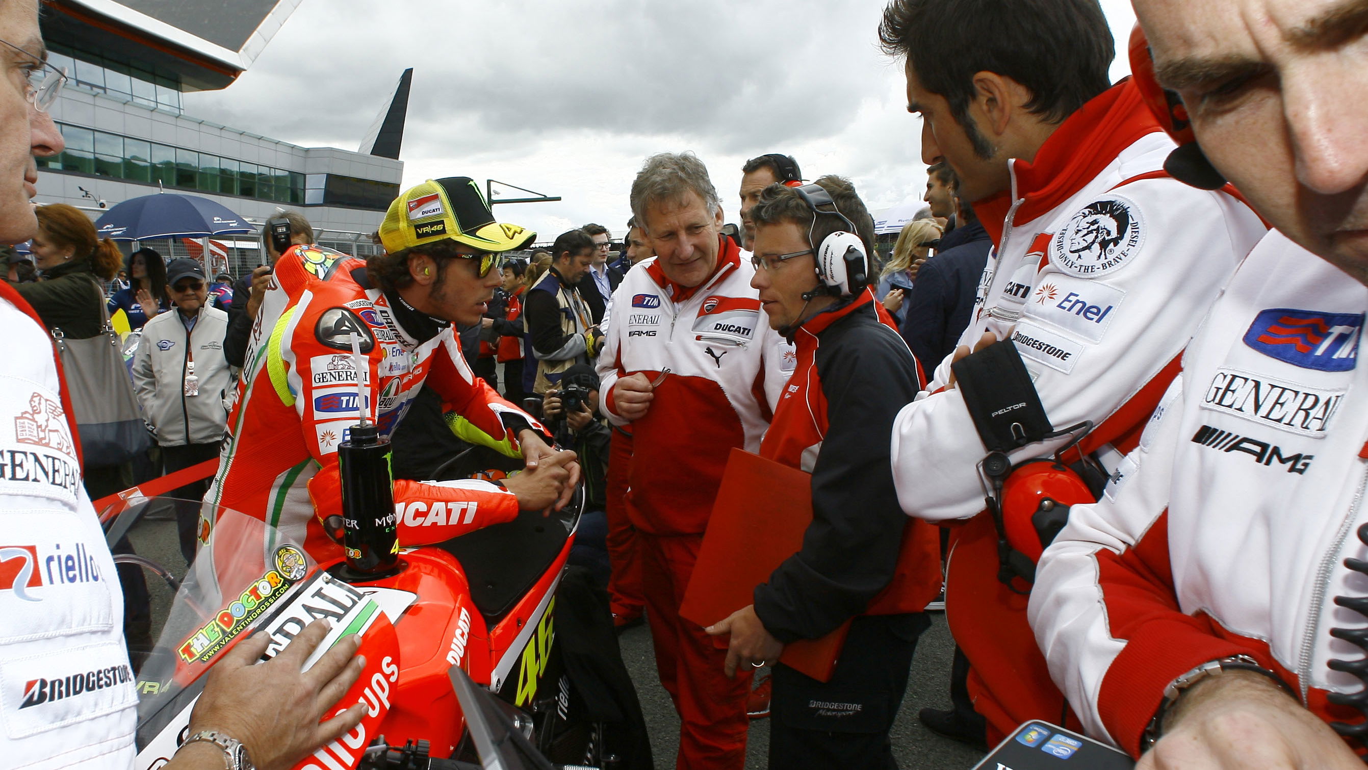 Rossi, Burgess and Bridgestone technician, British MotoGP 2012