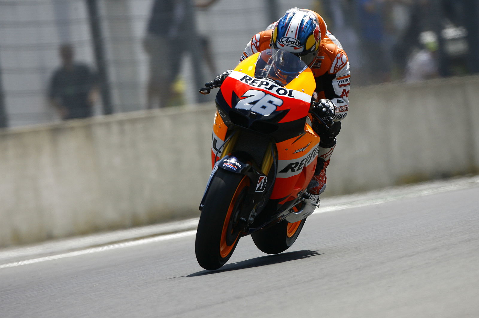 Pedrosa flat out, both wheels in air, Italian MotoGP 2012