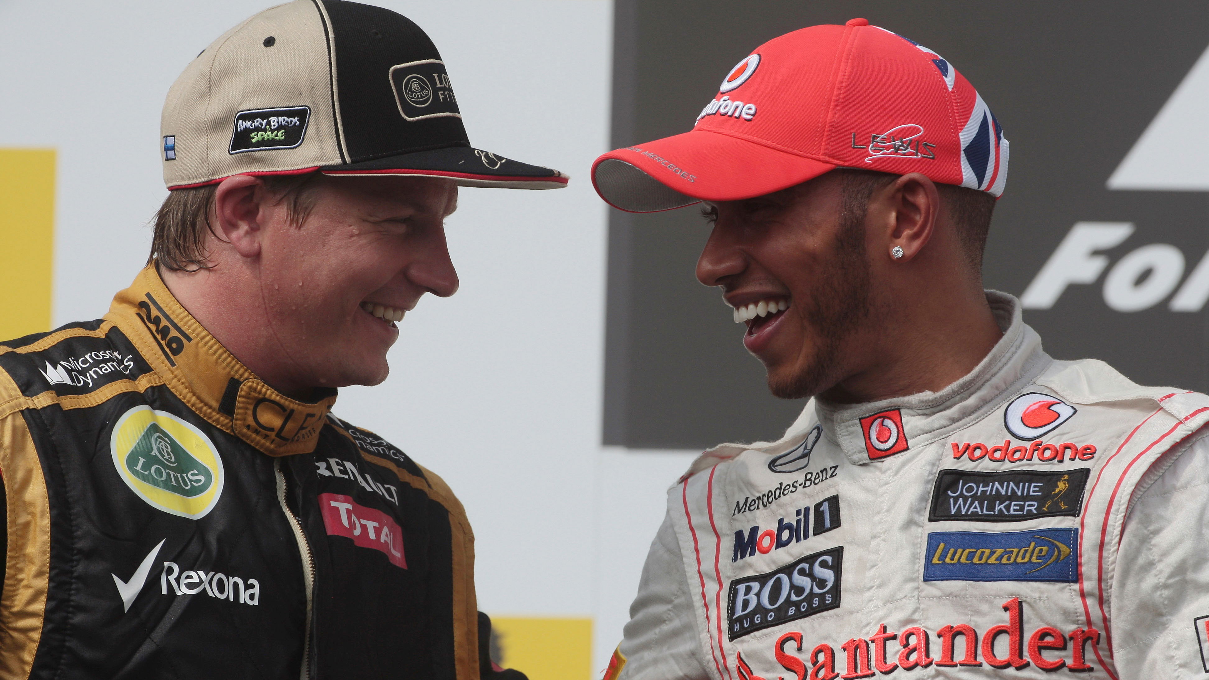 29.07.2012- Race, 2nd position Kimi Raikkonen (FIN) Lotus F1 Team E20 and Lewis Hamilton (GBR) McLar