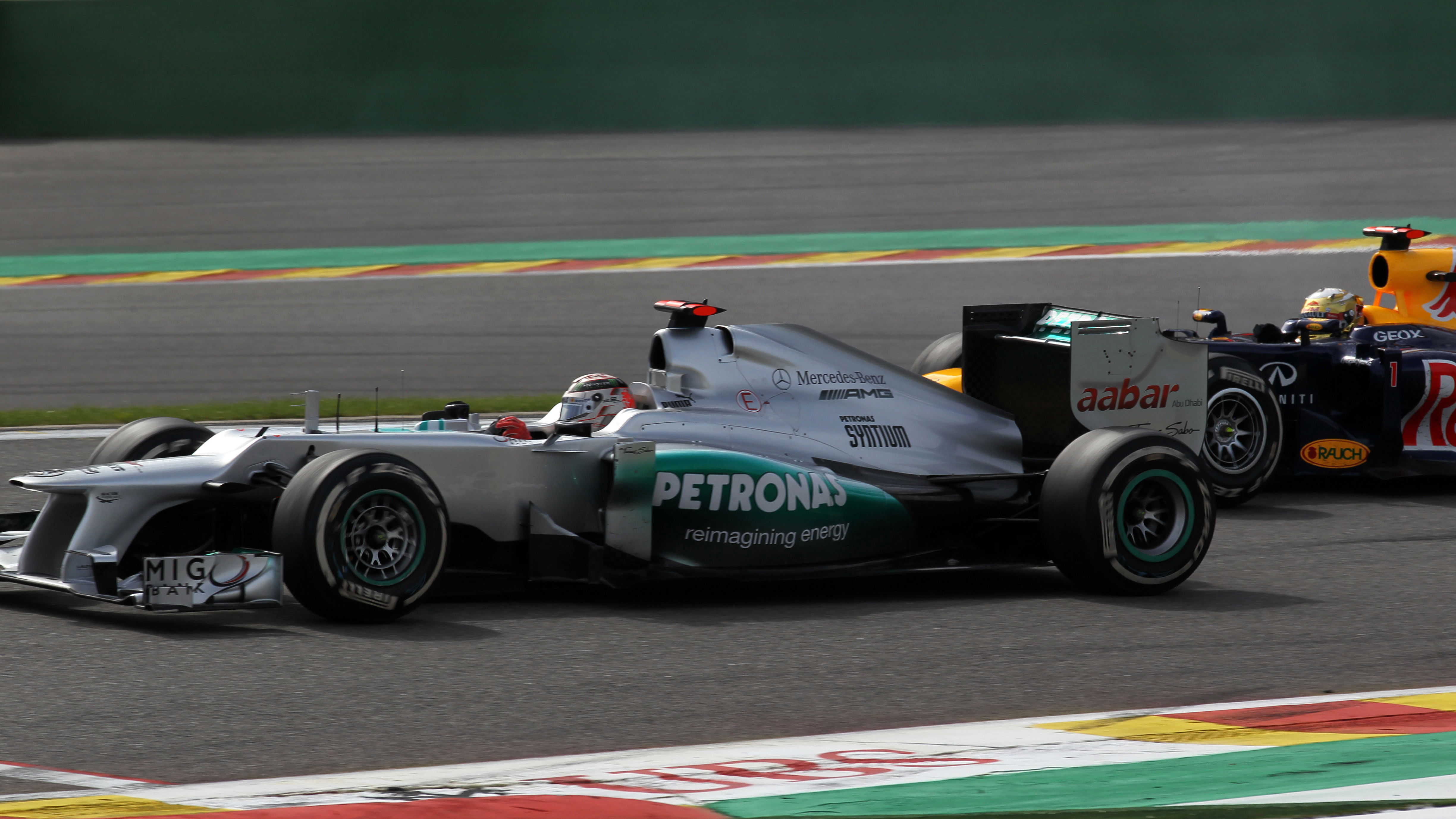 02.09.2012- Race, Michael Schumacher (GER) Mercedes AMG F1 W03 and Sebastian Vettel (GER) Red Bull R