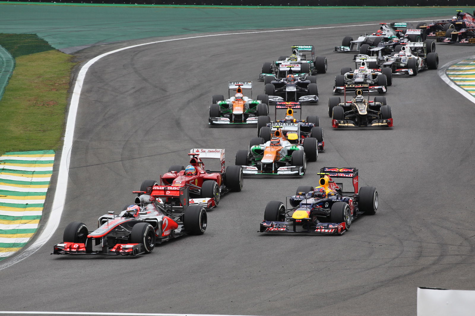 25.11.2012- Race, Start of the race, Jenson Button (GBR) McLaren Mercedes MP4-27 and Mark Webber (AU