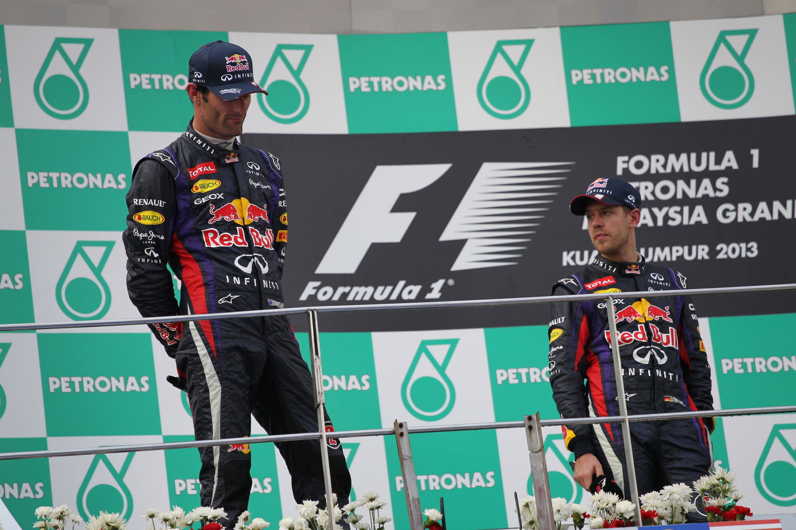 24.03.2013- Race, the podium; winner Sebastian Vettel (GER) Red Bull Racing RB9, 2nd Mark Webber (AU