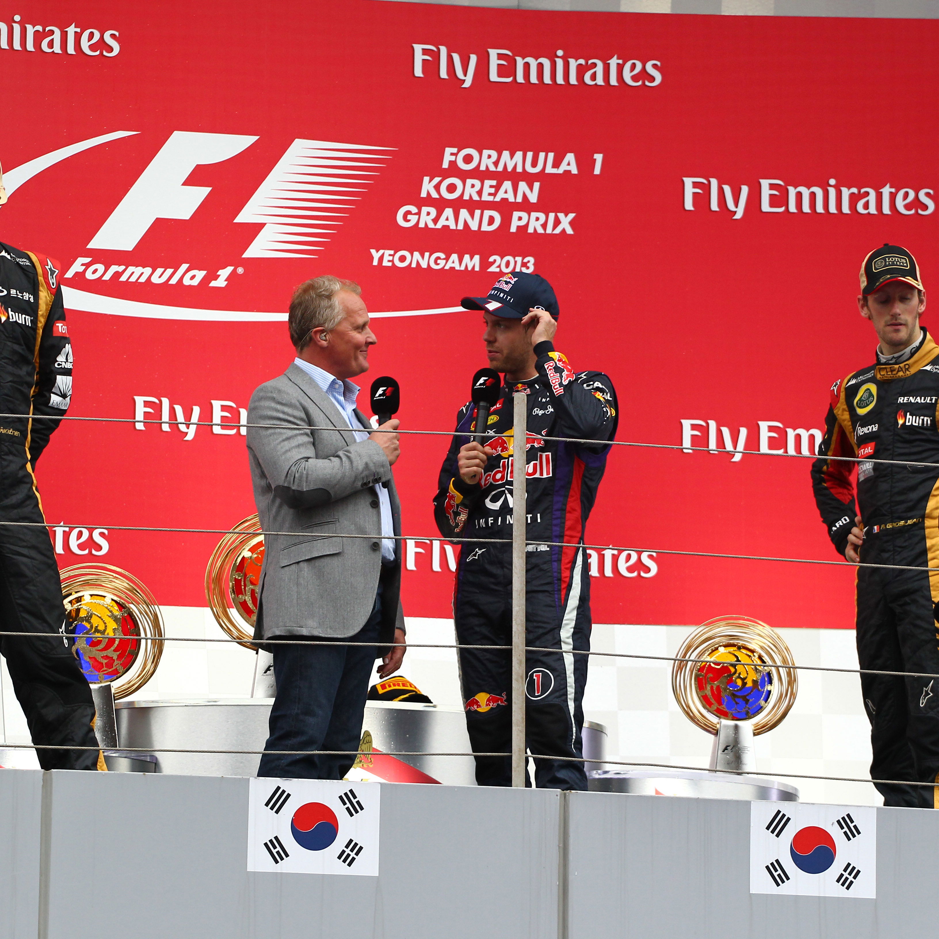 06.10.2013- The Podium, winner Sebastian Vettel (GER) Red Bull Racing RB9, 2nd Kimi Raikkonen (FIN)