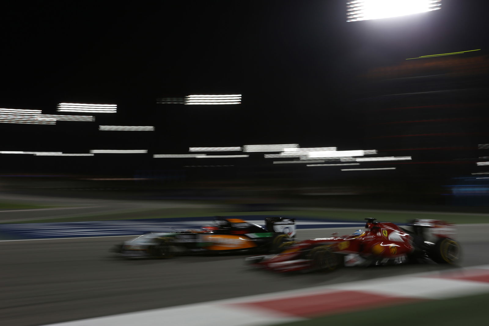 04.04.2014- Free Practice 2, Fernando Alonso (ESP) Scuderia Ferrari F14T and Nico Hulkenberg (GER) S