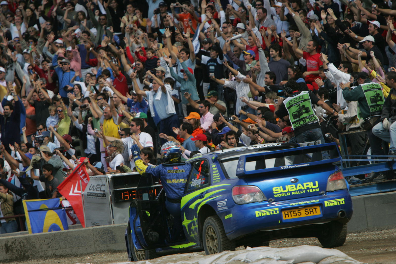 Petter Solberg celebrates at the finish in Argentina after taking second