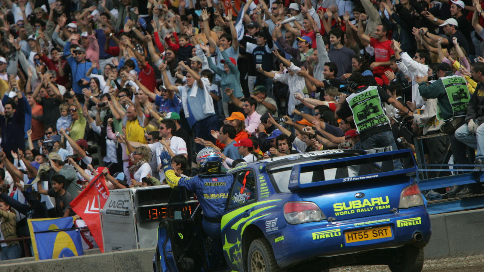 Petter Solberg celebrates at the finish in Argentina after taking second