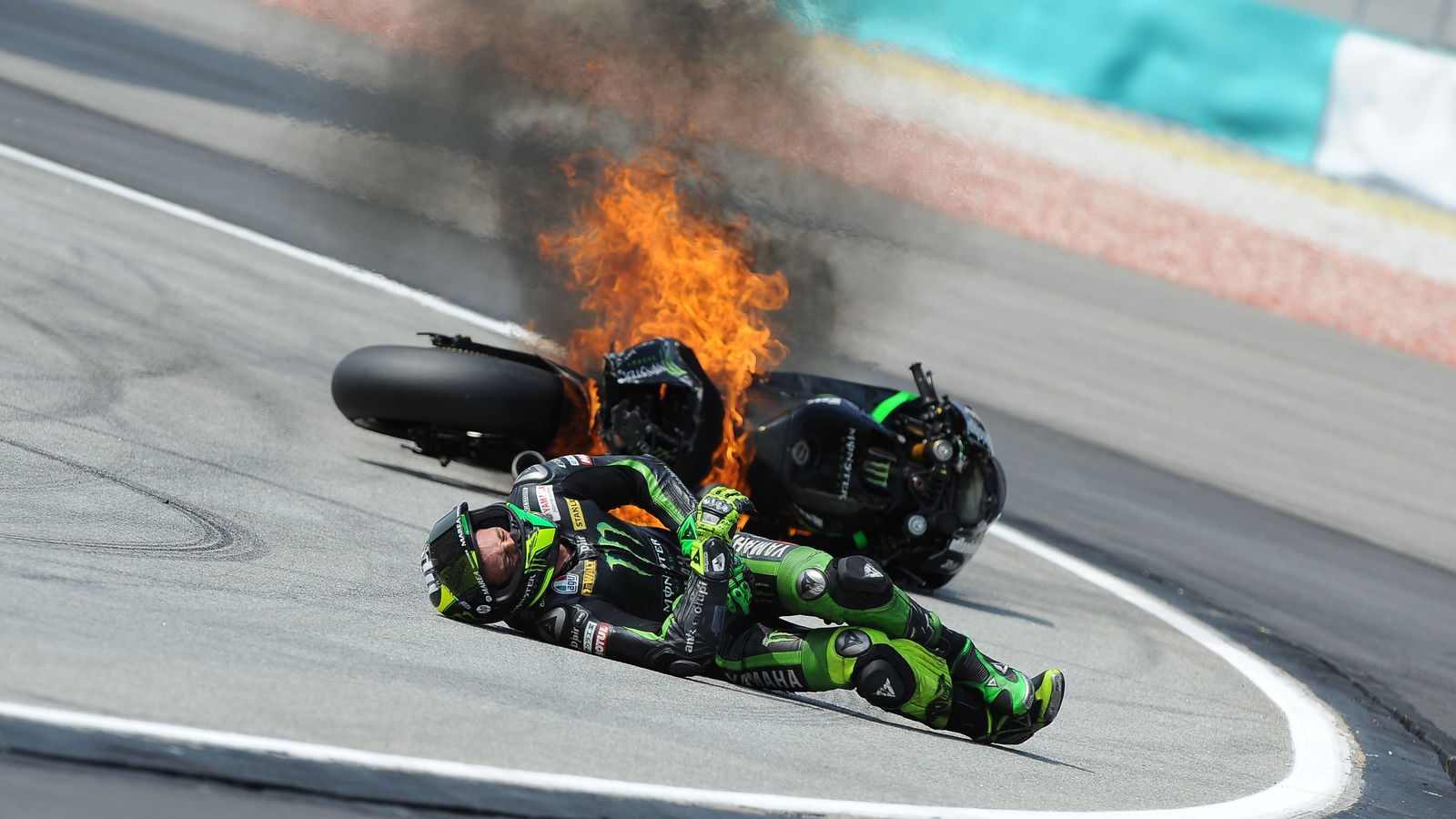PICS: Pol Espargaro's fiery Sepang fall