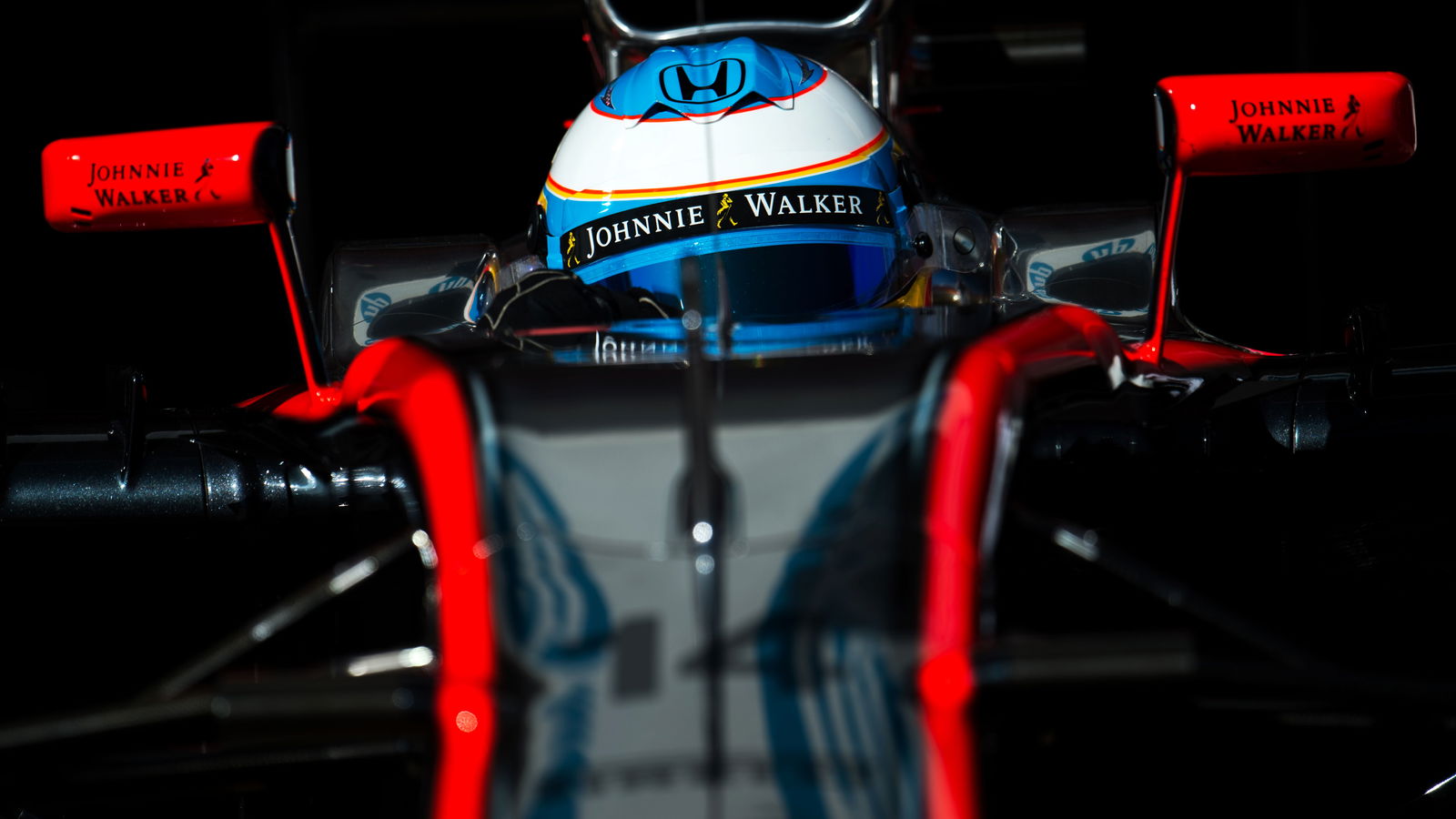McLaren blames wind for Alonso crash, slams electrocution rumours