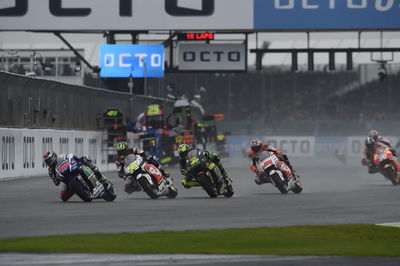 Rossi wins dramatic wet British GP