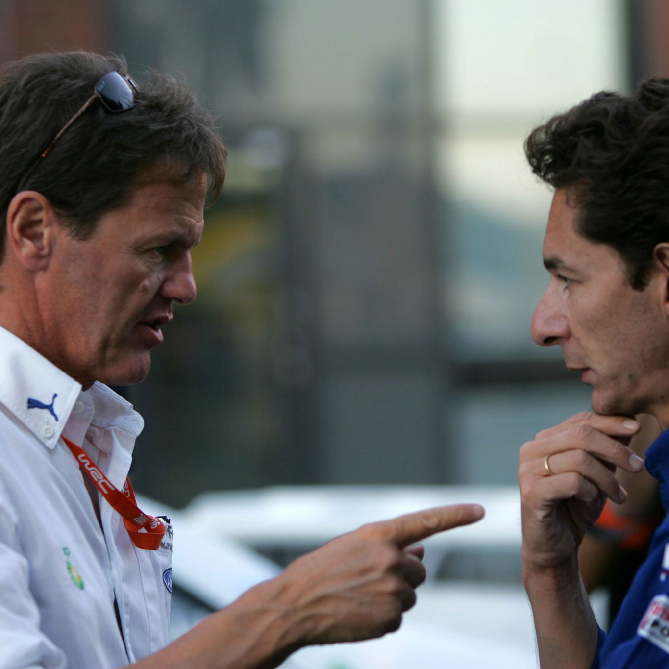 BP Ford boss, Malcolm Wilson chats to Kronos Citroen boss, Marc van Dalen World Rally of Finland, Wo