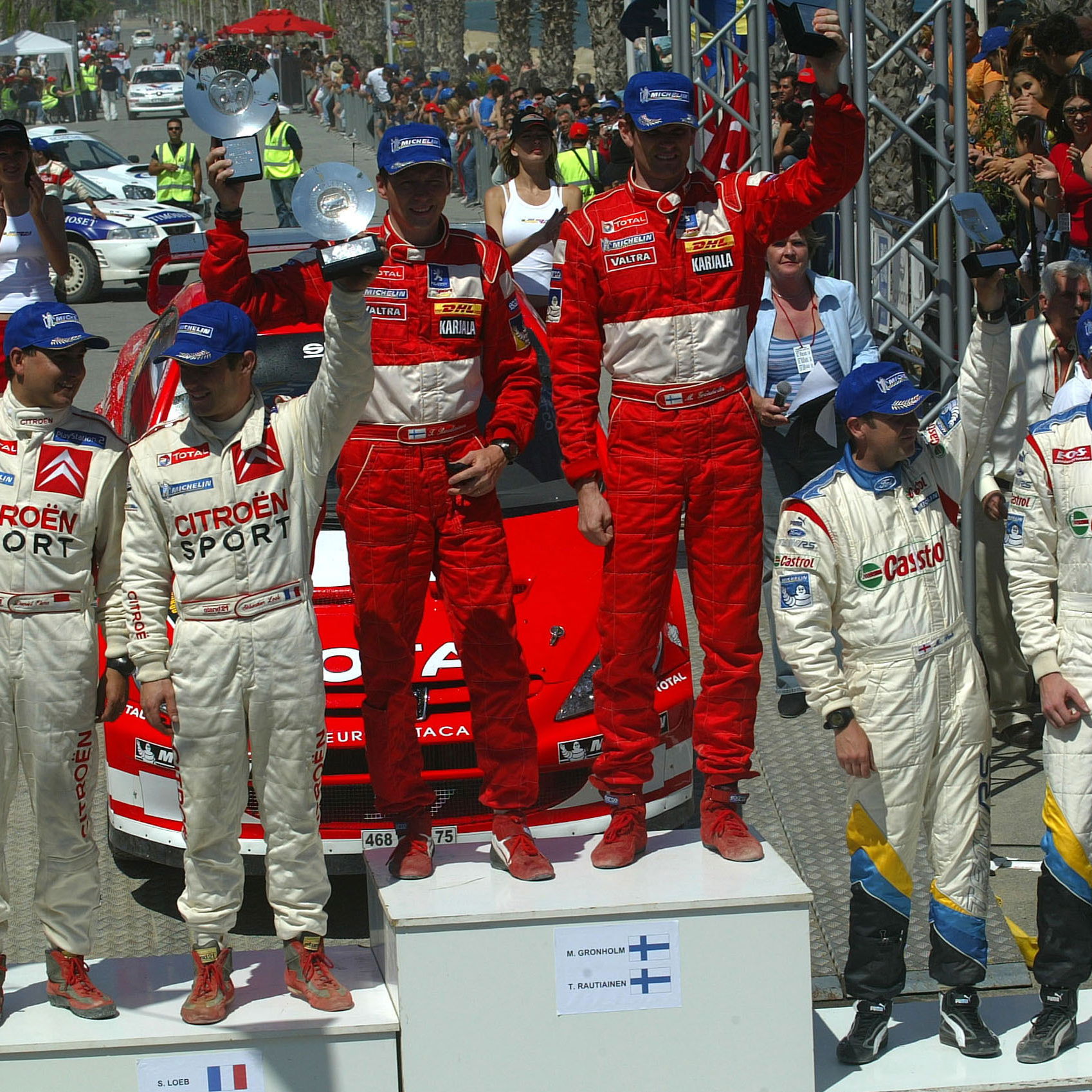 Cyprus Rally winners, Marcus Gronholm and Timo Rautiainen on the podium with Sebastian Loeb and Dani