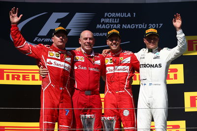 Vettel holds on for contentious Hungarian GP win