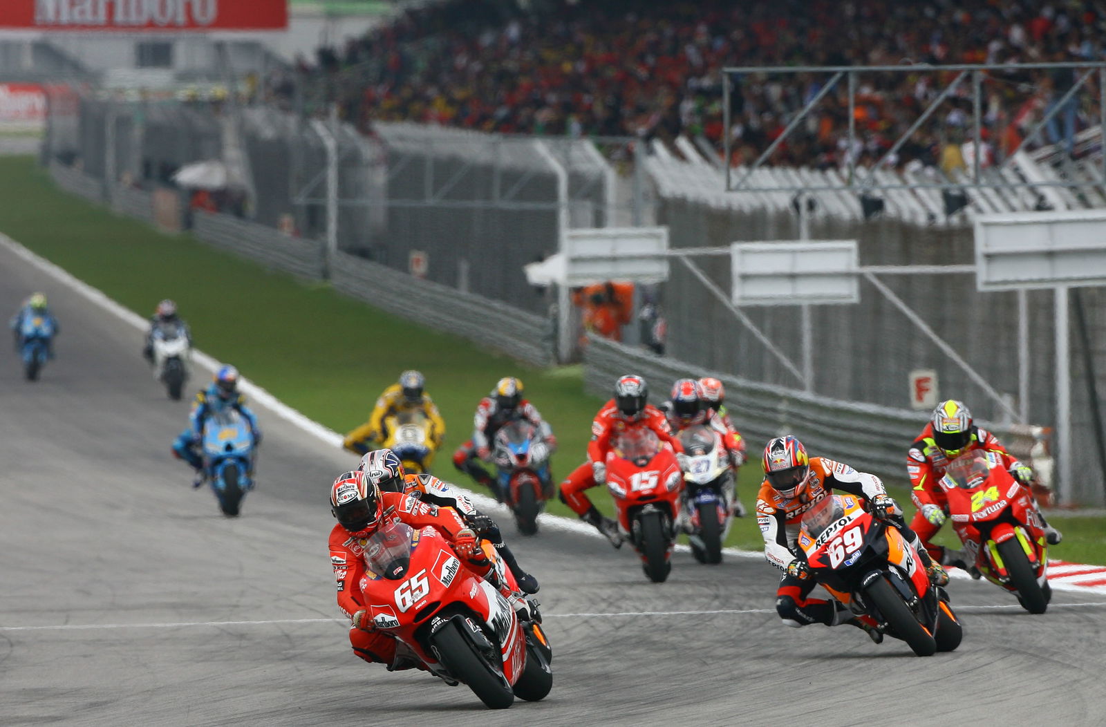 Capirossi leads, Malaysian MotoGP 2006.