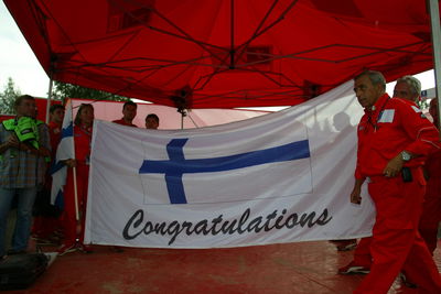 Corrado Provera, Peugeot Sport team principal and director,
celebrate in Finland