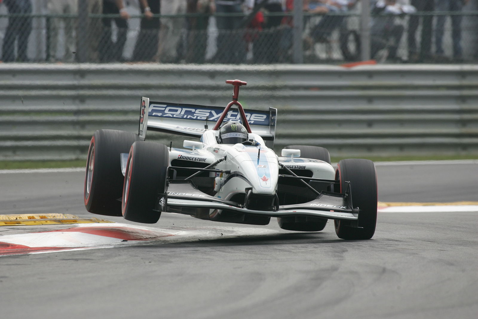 24-26 August 2007, Heusden-Zolder, BelgiumPaul Tracy jumps the curb through the chicane.