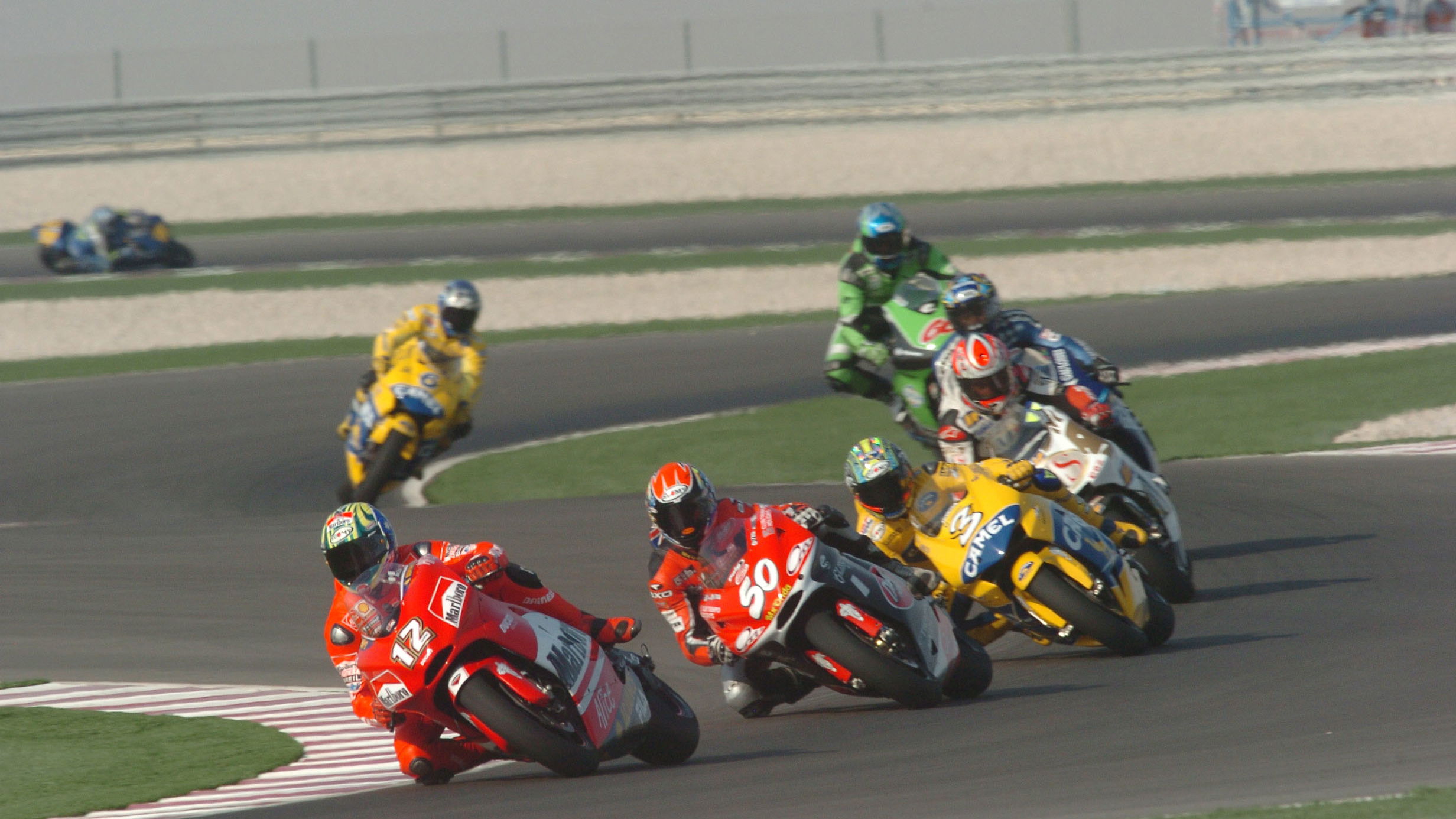 Bayliss, Hodgson, Biaggi, McWilliams et alQatar MotoGP, 2004