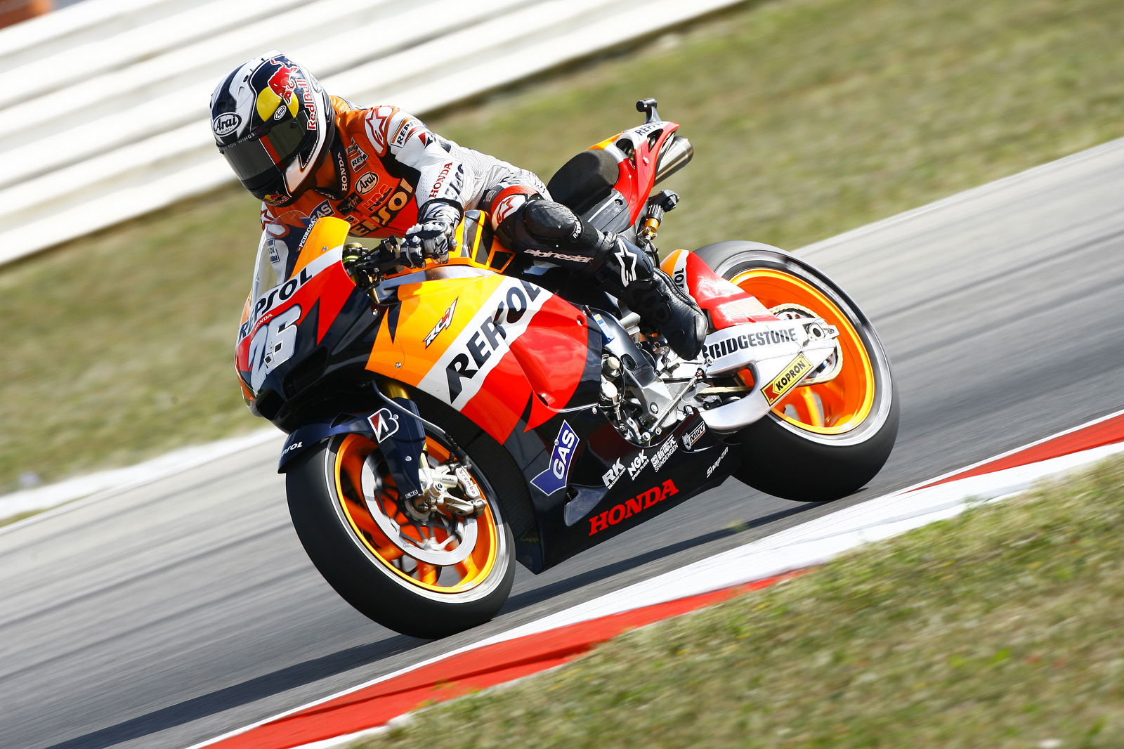 PICS: Hayden, Capirossi first lap clash at Misano